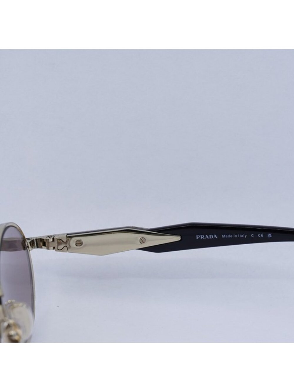 Prada PR65ZS ZVN20I Sunglasses Pale Gold Oval Frame, Light Purple Brown Lenses - Picture 5 of 12